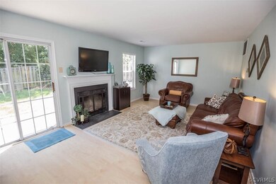 Beautiful family room with wood-burning fireplace