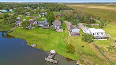 Serene, small-town living on the bayou from a bird's-eye view.