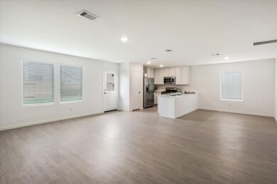 Open concept living! Kitchen open to dining and fa
