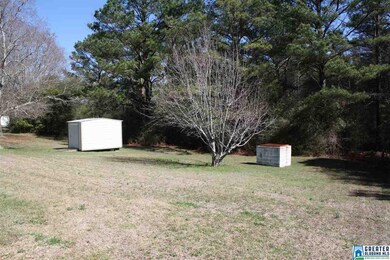 Level Back Yard with Storage building.