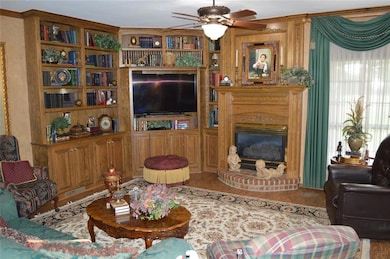 Living room featuring hardwood / wood-style floors