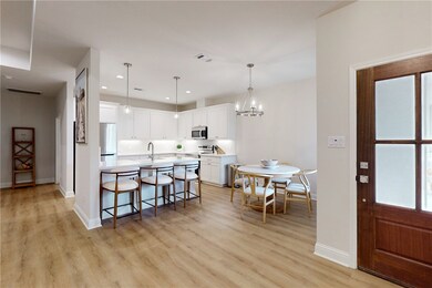 Kitchen featuring appliances with stainless steel