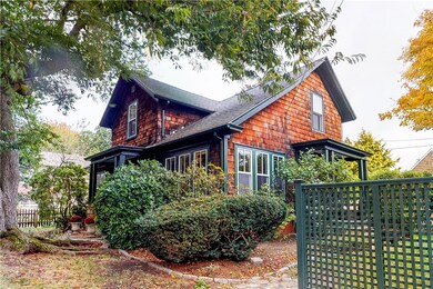 Side view shows one of several porches.  Gorgeous
