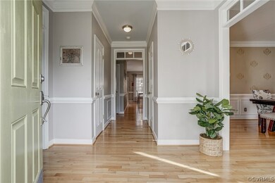 You'll be greeted by gleaming hardwood floors and