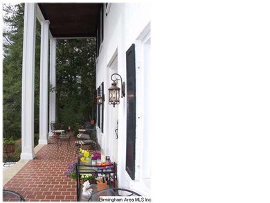 Wonderful covered porch with new 16 foot columns!