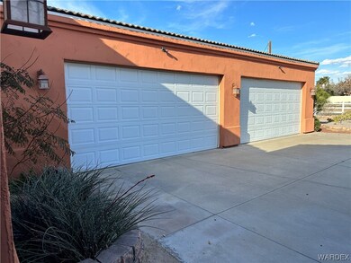 Attached 4 car boat deep Garages to home