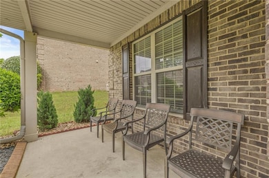 View of patio featuring covered porch