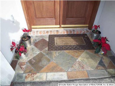 Entrance stoop is slate topped entry stoop framed 