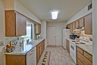 KITCHEN WITH PASS THRU TO FAMILY RM