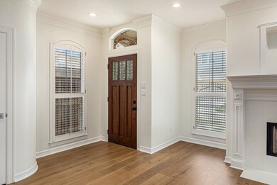 This is a bright and elegant entryway featuring a
