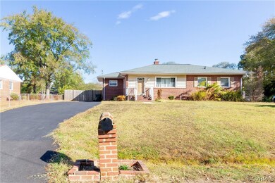 All Brick, privacy fenced in and beautifully landscaped.