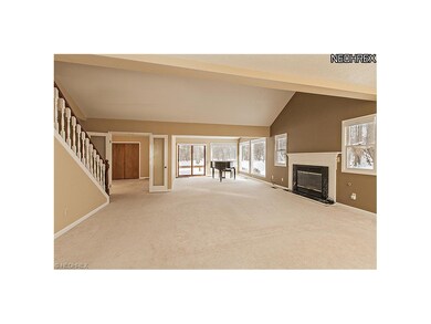 Great Room with Gas Fireplace & Cathedral Ceiling 