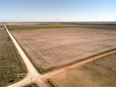 Birds eye view of property with a rural view