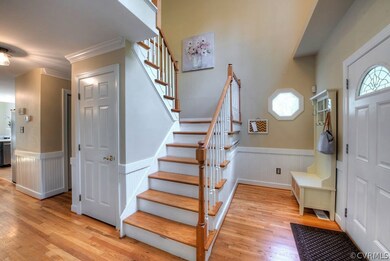 Two story foyer with a  drop zone area