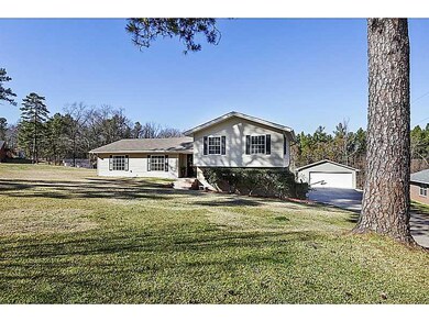 Photo. Sits far back from the road!