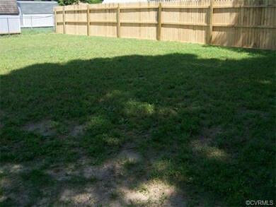 Back yard with back privacy fence
