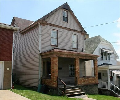 Alternate view of front facade and porch