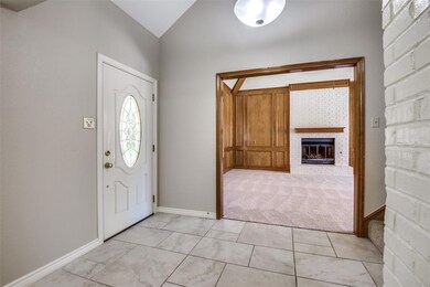 Spacious entry introduces you to the main living and dining areas.