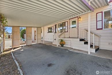 View of covered entry and stairs.