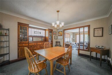 good sized dining room with built in cabinets