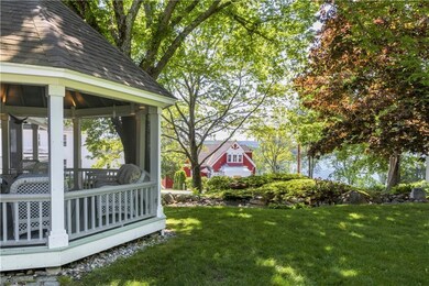 Screened porch with water view.