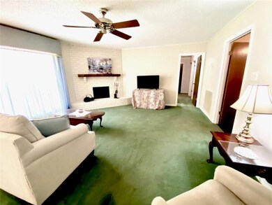 Enjoy this living area and fireplace to make memor