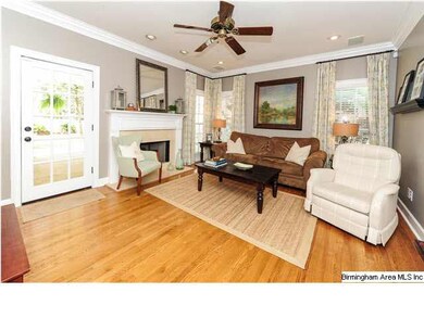 Spacious family room w/gas log fireplace with marb