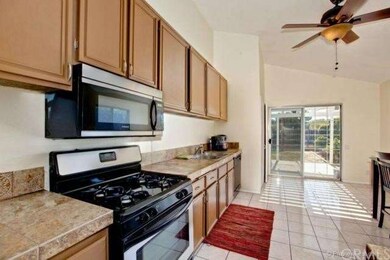 Nicely updated kitchen opens to back patio.
