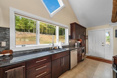 sink with view, sink, dishwasher, trash compactor