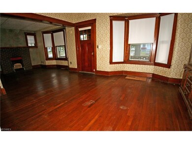 Large Living room with hardwood flooring. Carpet w