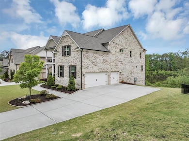 View of property exterior with concrete driveway, 