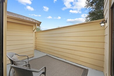 Courtyard between garage and backdoor.