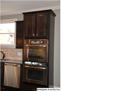 Stainless GE double oven and dishwasher