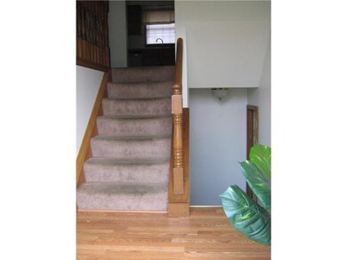 Foyer. Front entrance looking up to first floor.