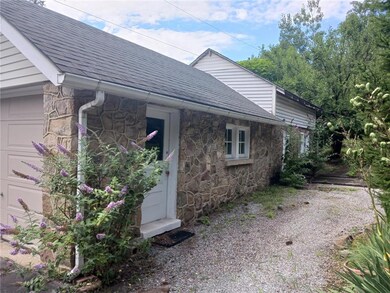 Stone garage with workshop
