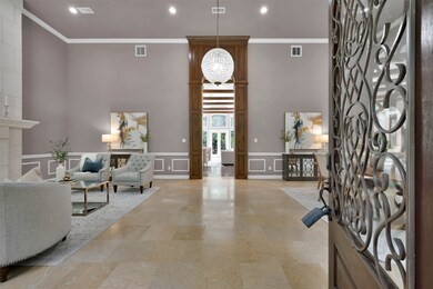 When you first enter the striking wood archway draws your eye through to the far back of the home, creating a magnificent feeling for the depth of this house.