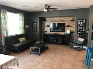 Upgraded entertainment niche with floating shelves