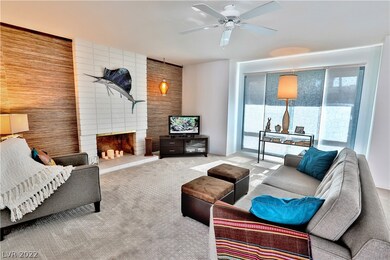 Look at that window and original fireplace!
