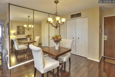 Elegant hand-scraped flooring and wall of mirrors give this a New York flair from the moment you step in!