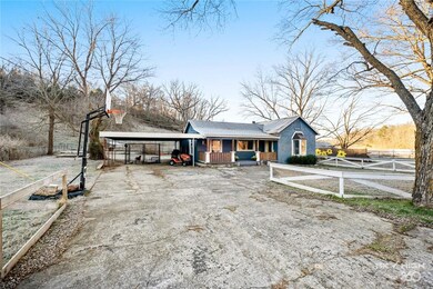 Large, wide driveway plus carport has abundant room for you and your guests to park.