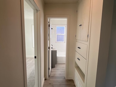 Hall with light wood-type flooring