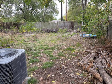 backyard with wood fence.