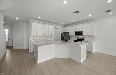Interior photos are of a similar Augusta plan. Ill