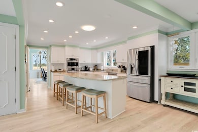 Kitchen featuring light wood finished floors, a ki