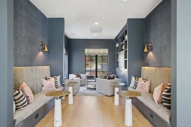 Living area featuring hardwood / wood-style floors