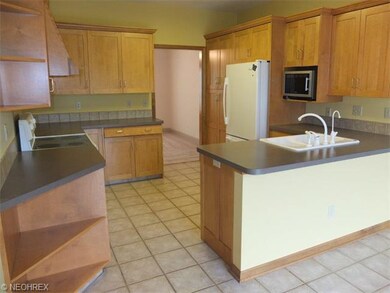 Fully applianced kitchen with pantry.