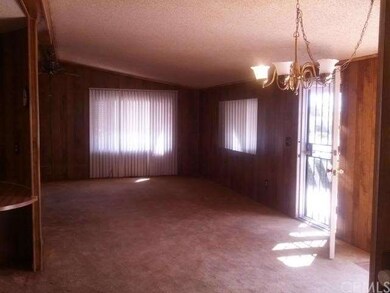 Partial view of family room and dining area at ent