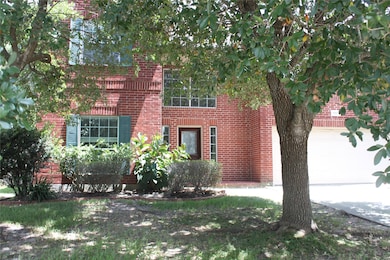 Shade trees in the front yard.