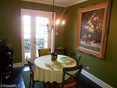Breakfast. On the other side of the kitchen is the breakfast area which has an exit to the back yard.