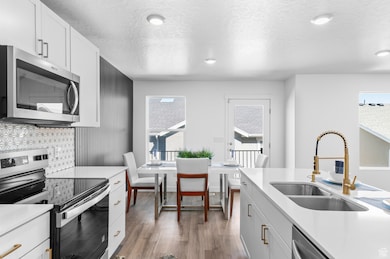 8596 W Bowie Dr, Magna, UT 84044 - photo 5